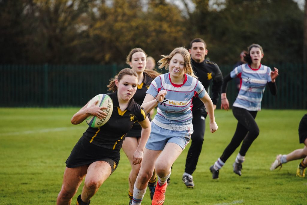 Students playing rugby