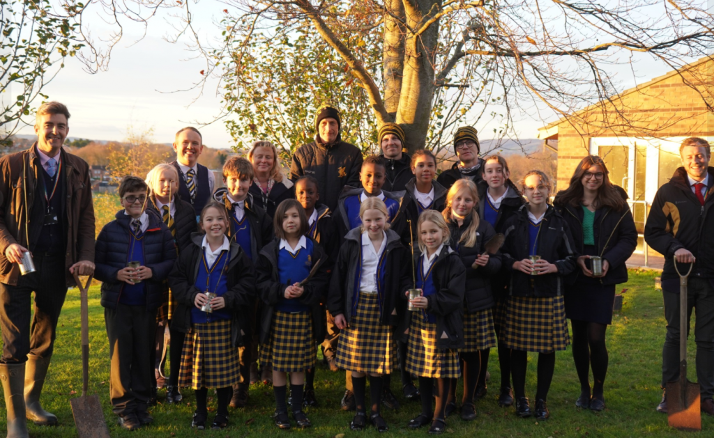 Students getting ready to plant