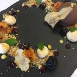 A dessert placed on a slate plate