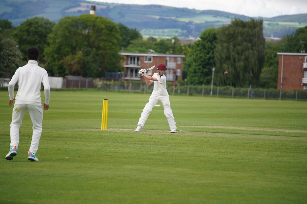 Student swinging the bat