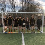 boys in their football kit