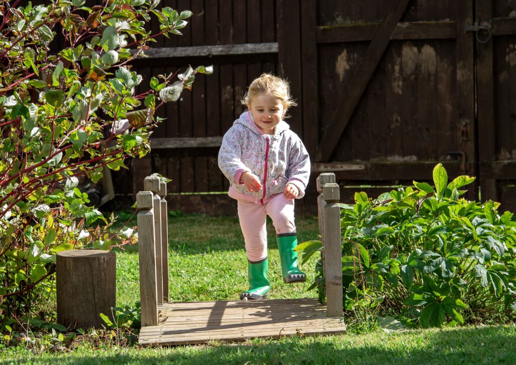 Queen's College Nursery pupil playing
