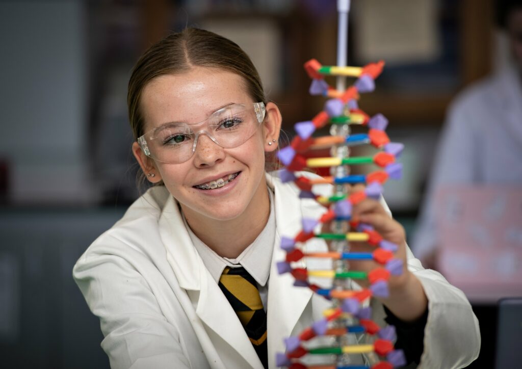 Queen's College pupil in a Biology lesson