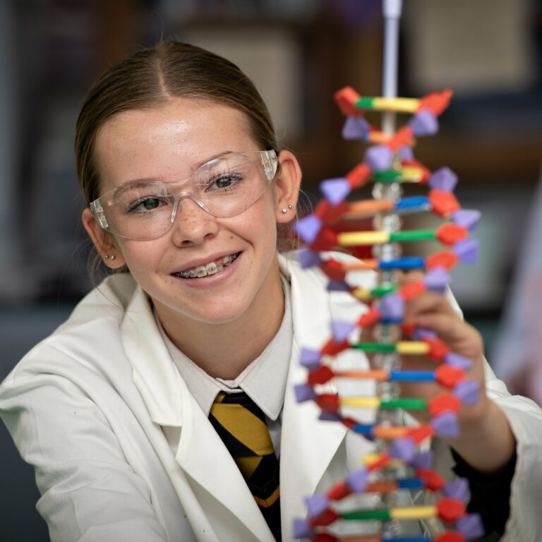Queen's College pupil in a Biology lesson