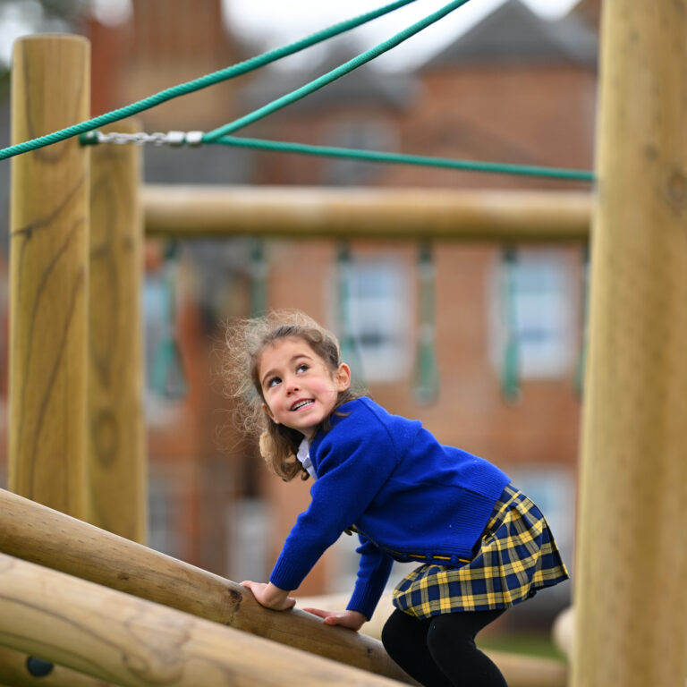 Queen's College Pre-Prep pupil on pay equipment