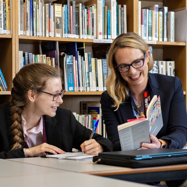 Queen's College Sixth Form pupil with a teacher