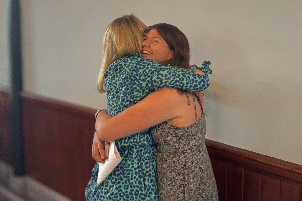 Pupil embraces teacher upon receiving A Level Results