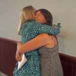 Pupil embraces teacher upon receiving A Level Results