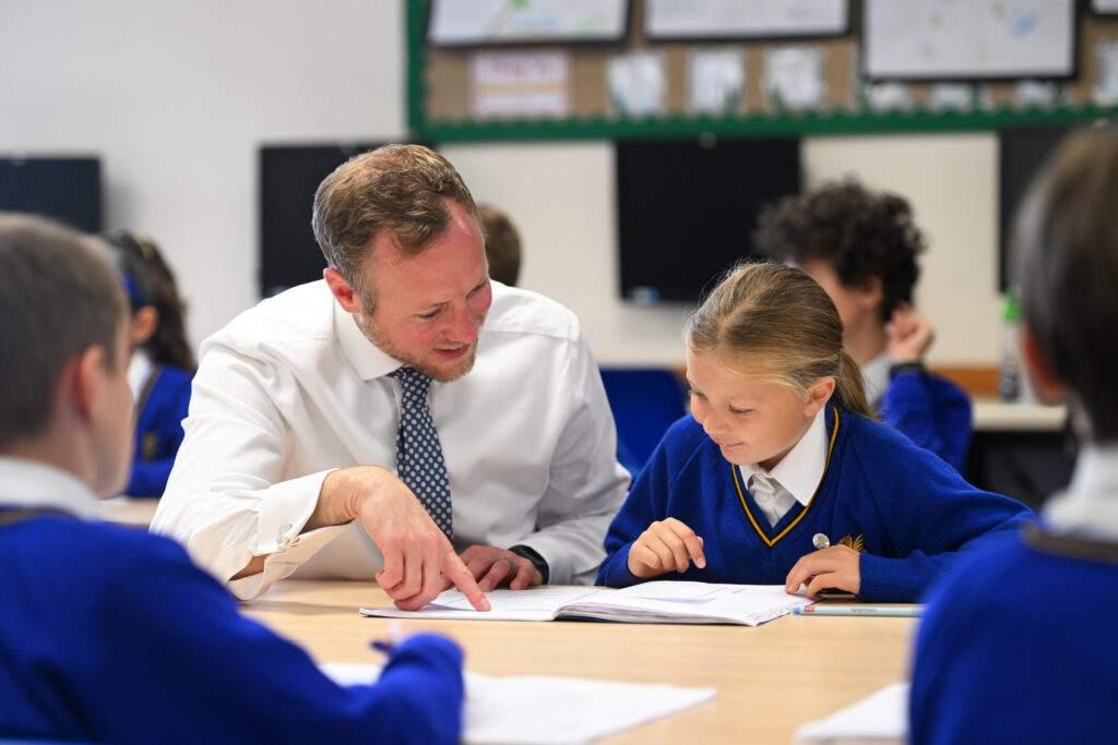 Queen's College Prep pupil in a lesson with a teacher