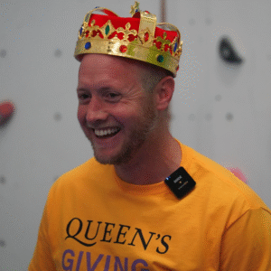 Head of Prep Henry Matthews wearing a crown 
