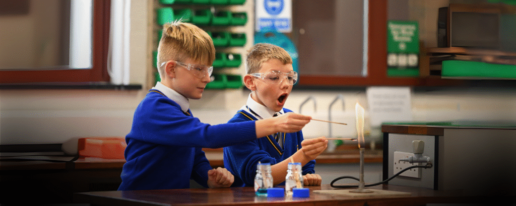 Queen's College Prep pupils doing a chemistry experiment