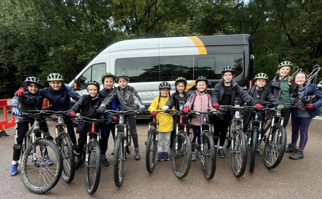 A group of children on bicycles