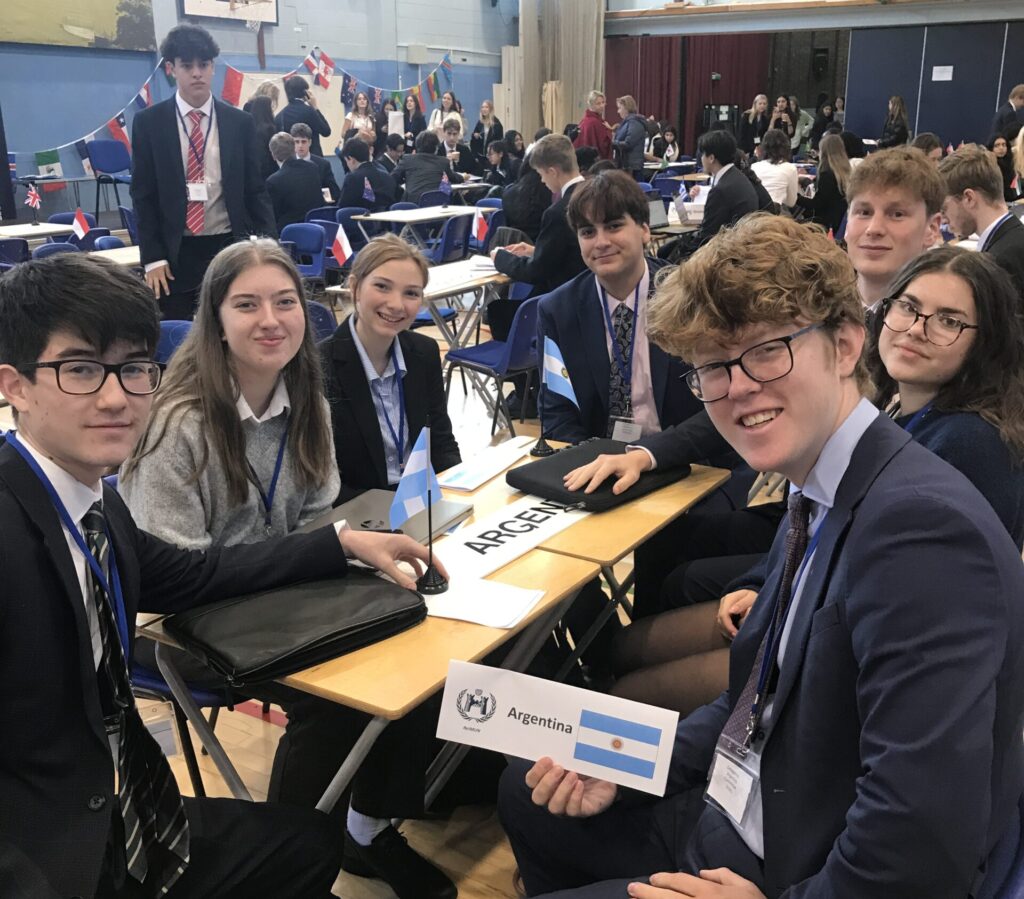 Pupils sat at a table at Reigate MUN
