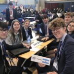 Pupils sat at a table at Reigate MUN