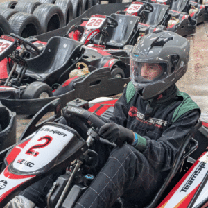 Boarder in a go-kart. 