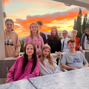 Pupils enjoying the sunset at the hotel.